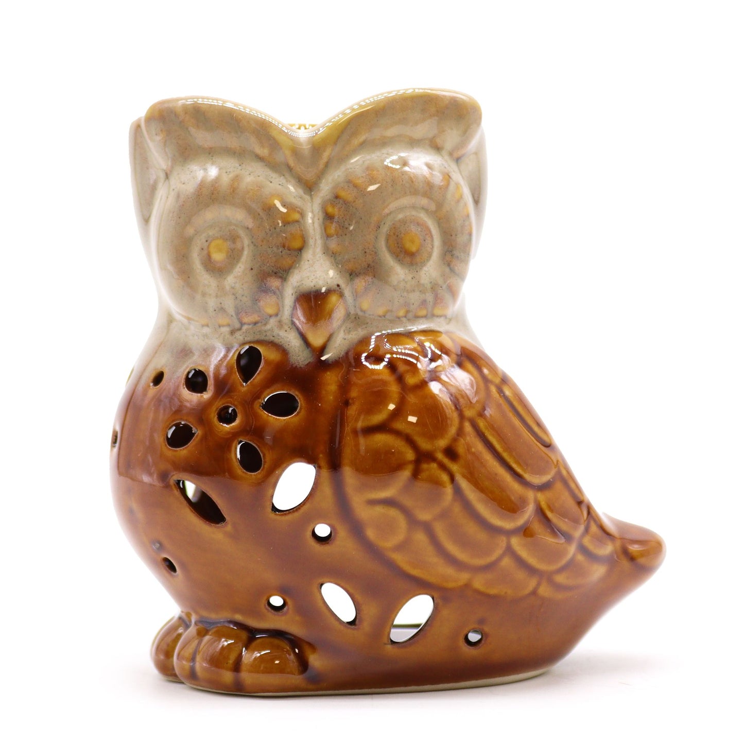 Rustic terracotta ceramic oil burner with a side-on owl design and tactile finish.