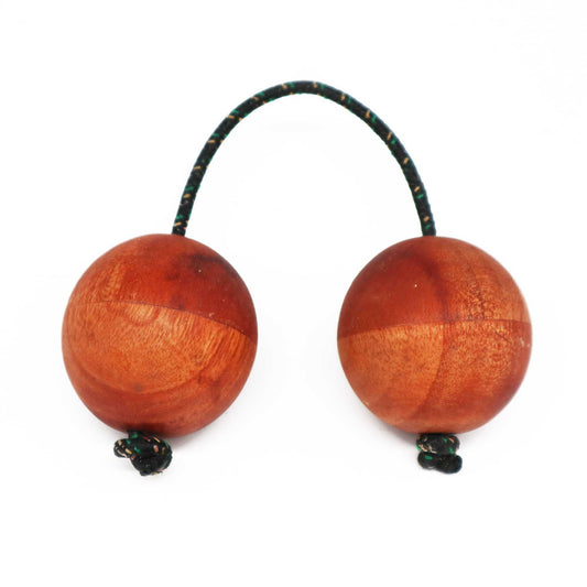 Handcrafted suar wood Kasaka shaker with a natural forest-inspired finish and rounded wooden beads.