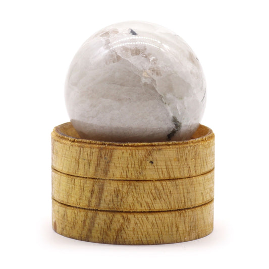 A smooth, polished 40mm Indian moonstone sphere with pearly white and grey tones resting on a small wooden stand.