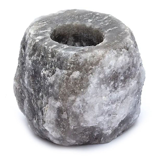 Handcrafted grey Himalayan salt tealight candle holder with a rough, natural texture and a central candle well.