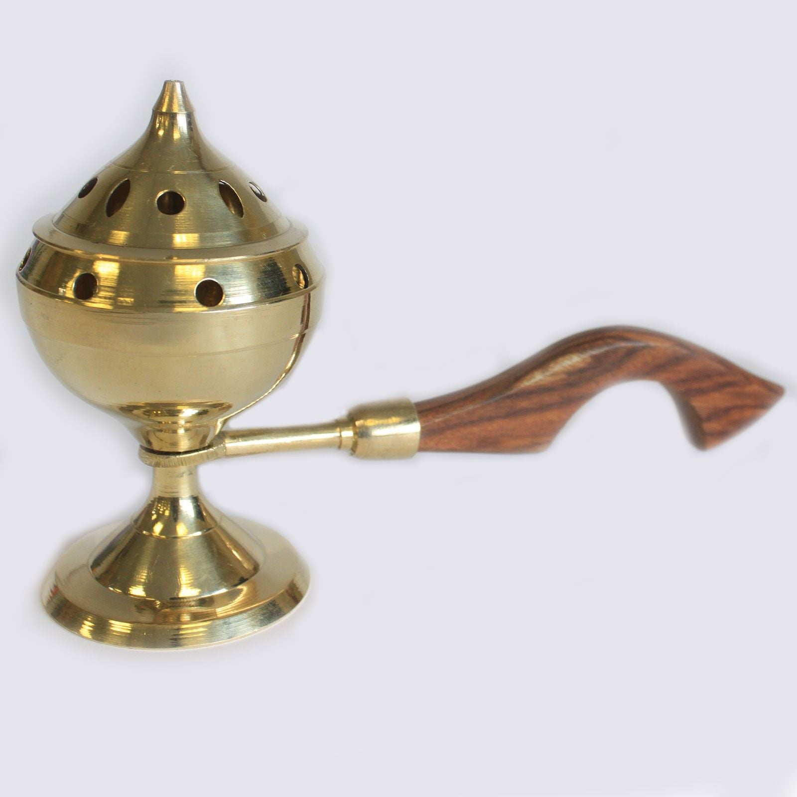 Polished solid brass censer burner featuring a protective wooden handle for safe ritual and meditation use.
