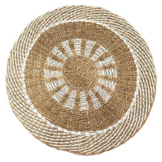 Round seagrass rug with a white outer border and a tan sun-shaped woven pattern in the centre.