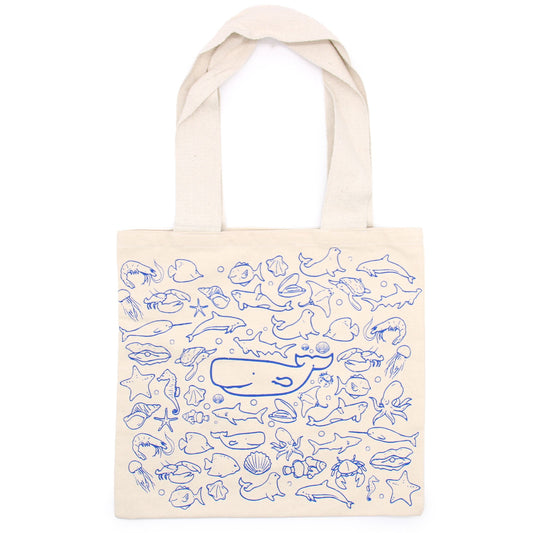 Large cream cotton tote bag with a blue and grey sea life illustration featuring various ocean creatures and coral.