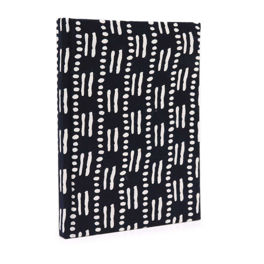 Handcrafted cotton bound notebook featuring a black and white dots and dashes pattern with a textured fabric cover.