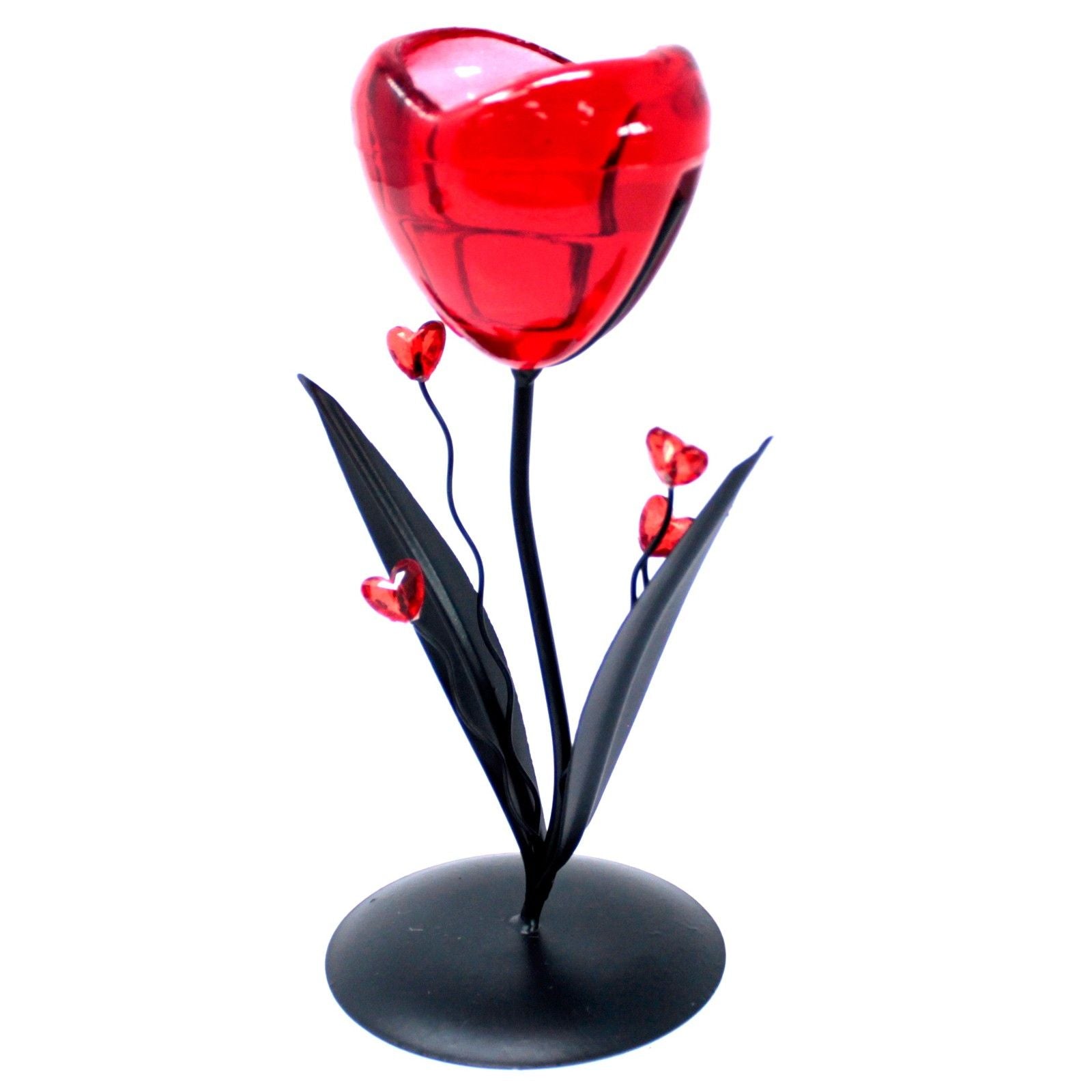 Ornate metal candleholder featuring a delicate single heart and flower design for a romantic ambient glow.
