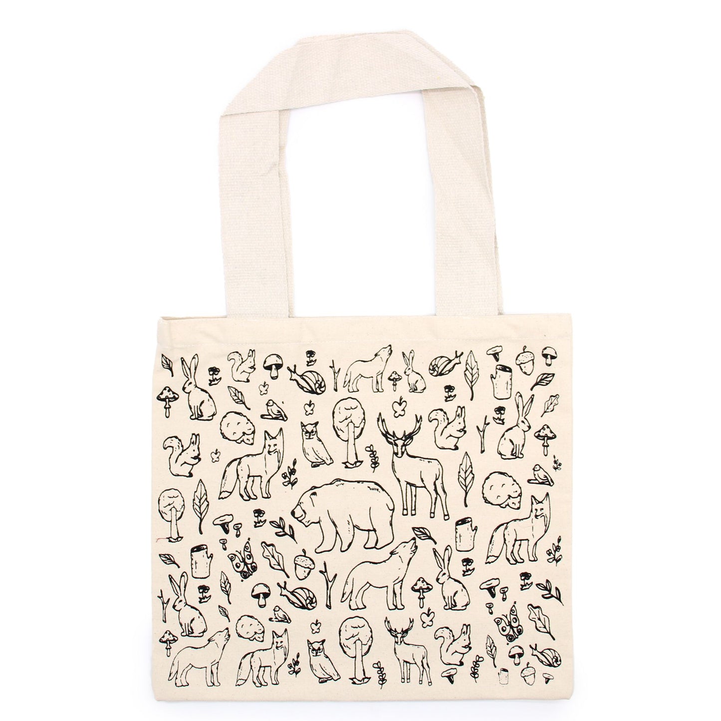 Large cream cotton tote bag featuring a green forest life botanical print with trees and wildlife.
