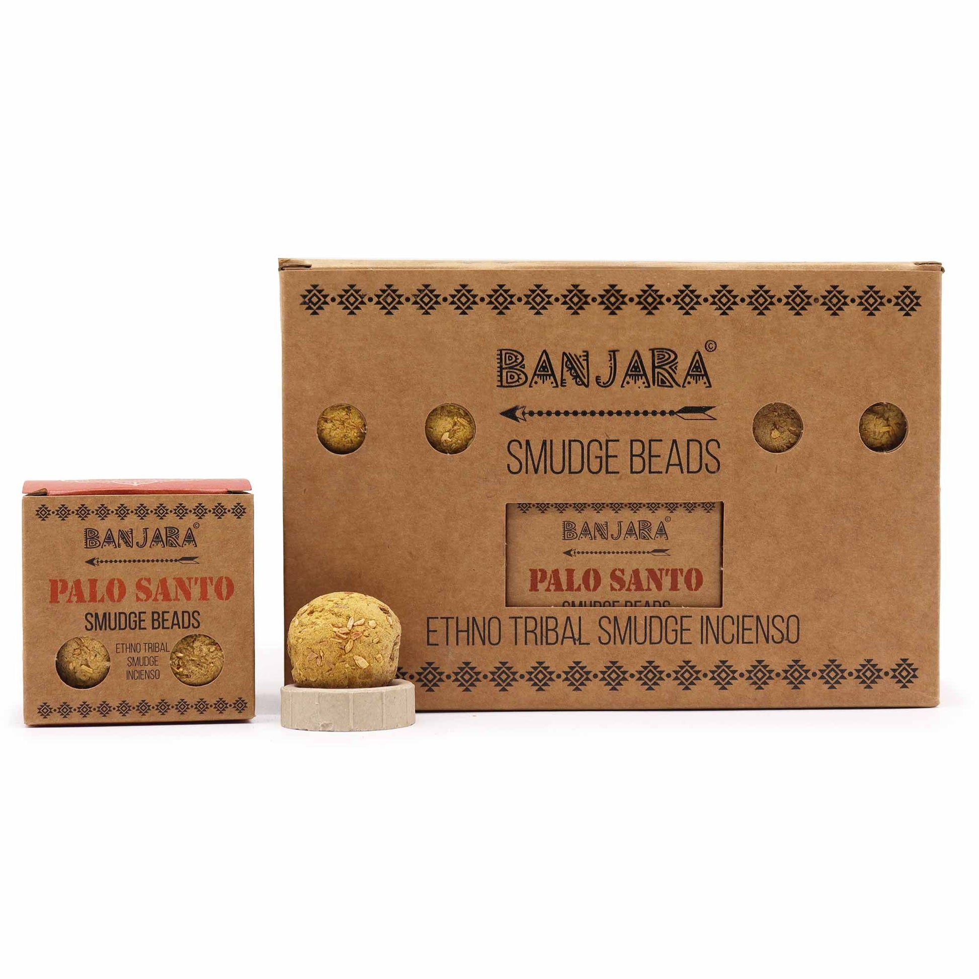 Small round dark textured smudge beads made from compressed aromatic herbs and Palo Santo resin.