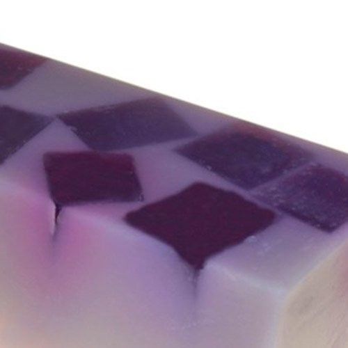 Large rectangular 10kg bulk soap loaf with a vibrant purple violet floral design and smooth texture.
