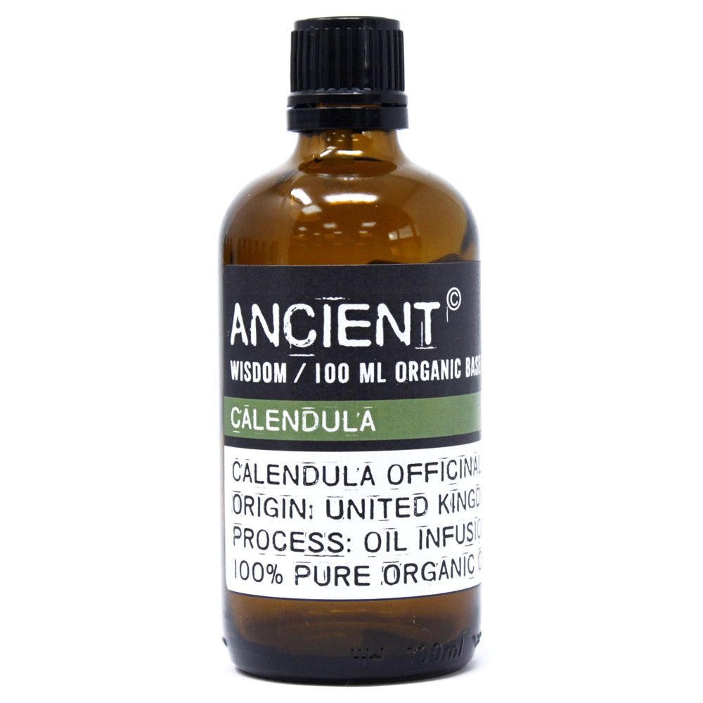 Clear glass bottle containing 100ml of golden organic calendula base oil for aromatherapy and skincare.