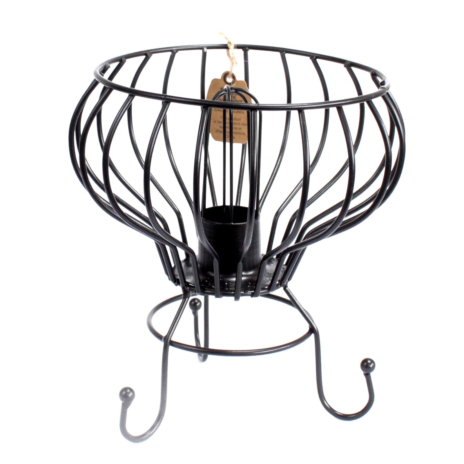 Rustic low industrial iron lamp frame containing natural Himalayan salt rocks with a glowing light bulb inside.