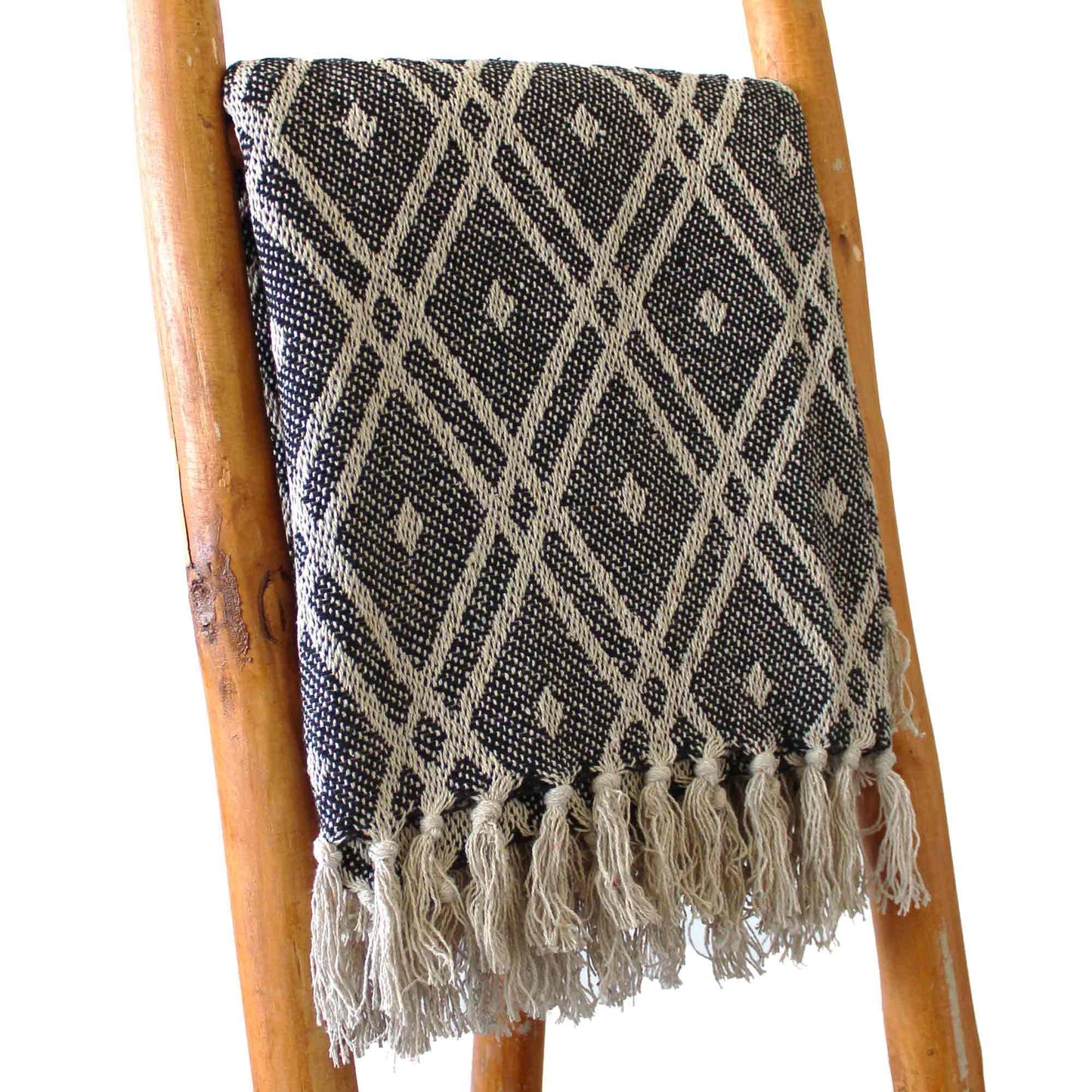 Soft 100% cotton throw featuring an elegant black and beige regency pattern with decorative tasselled edges.