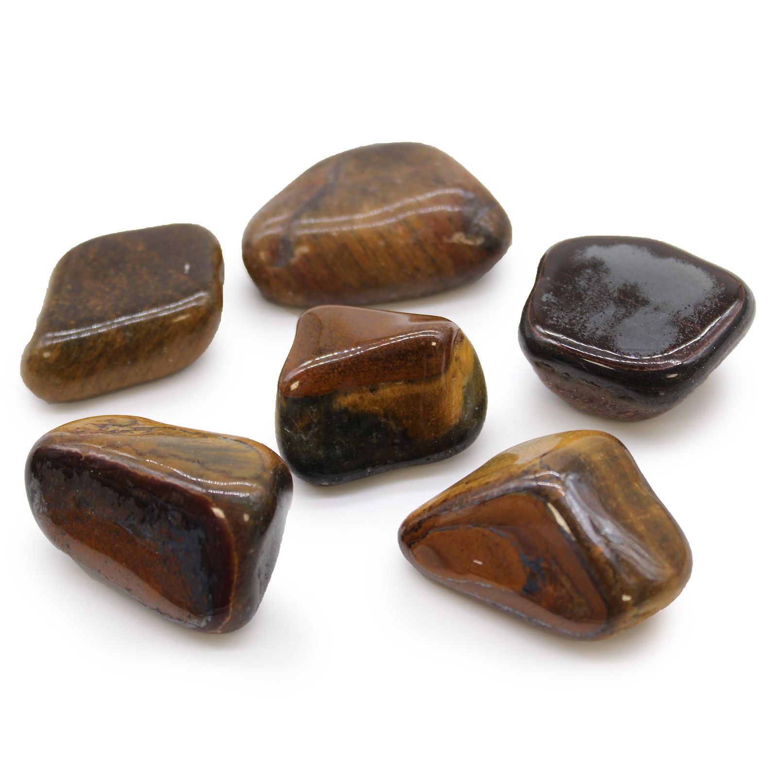 Large polished Tiger's Eye tumble stone showing rich golden-brown variegated bands and silky lustre.