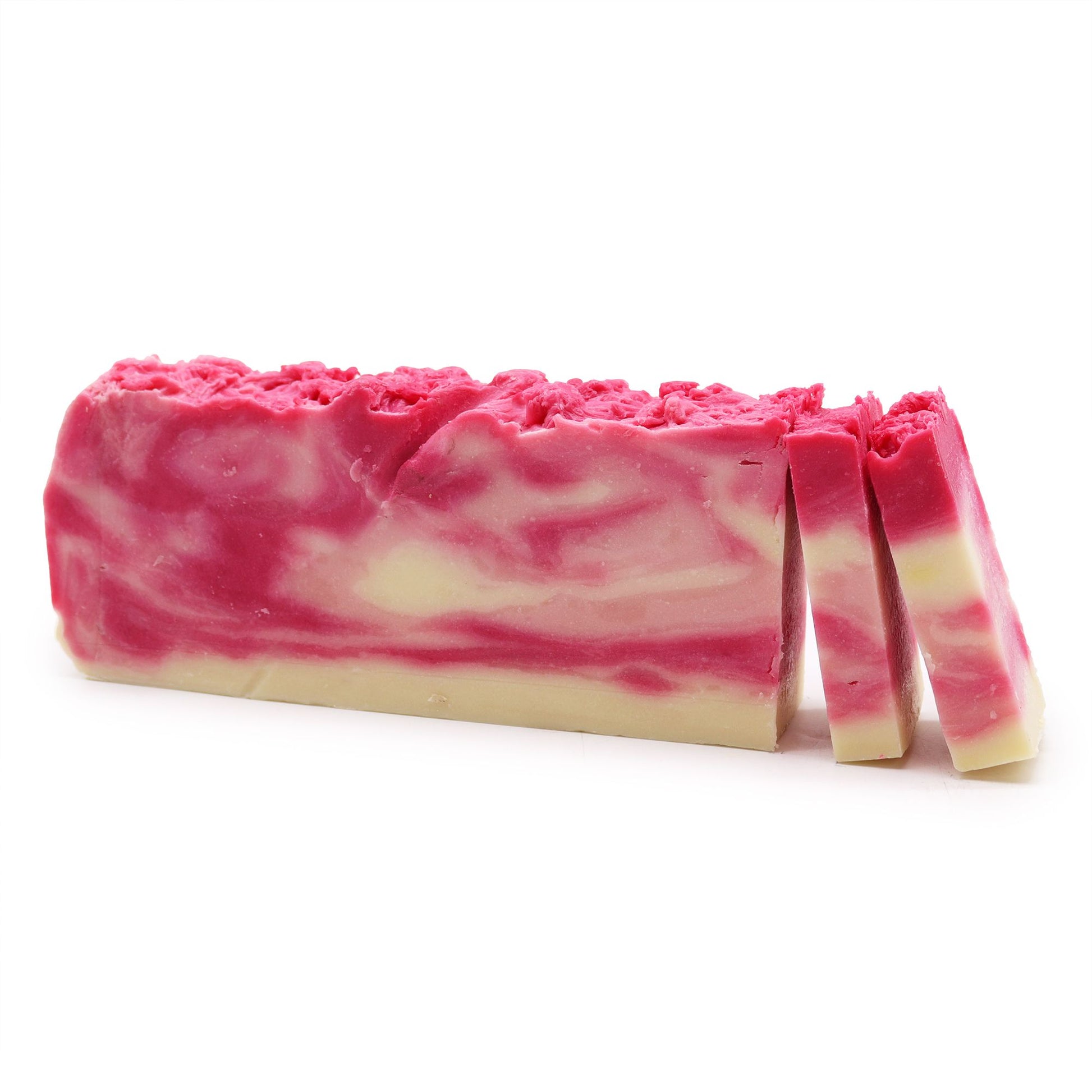 Large rectangular artisan soap loaf with rosehip botanical infusions and a natural textured surface.