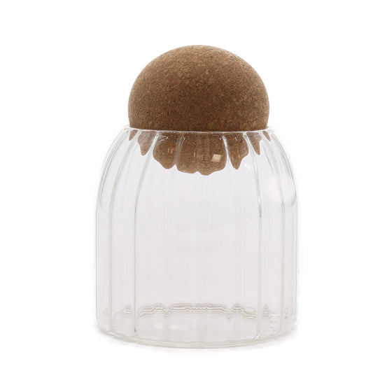 Elegant 10cm ribbed glass storage jar with a round cork ball lid in a minimalist style.