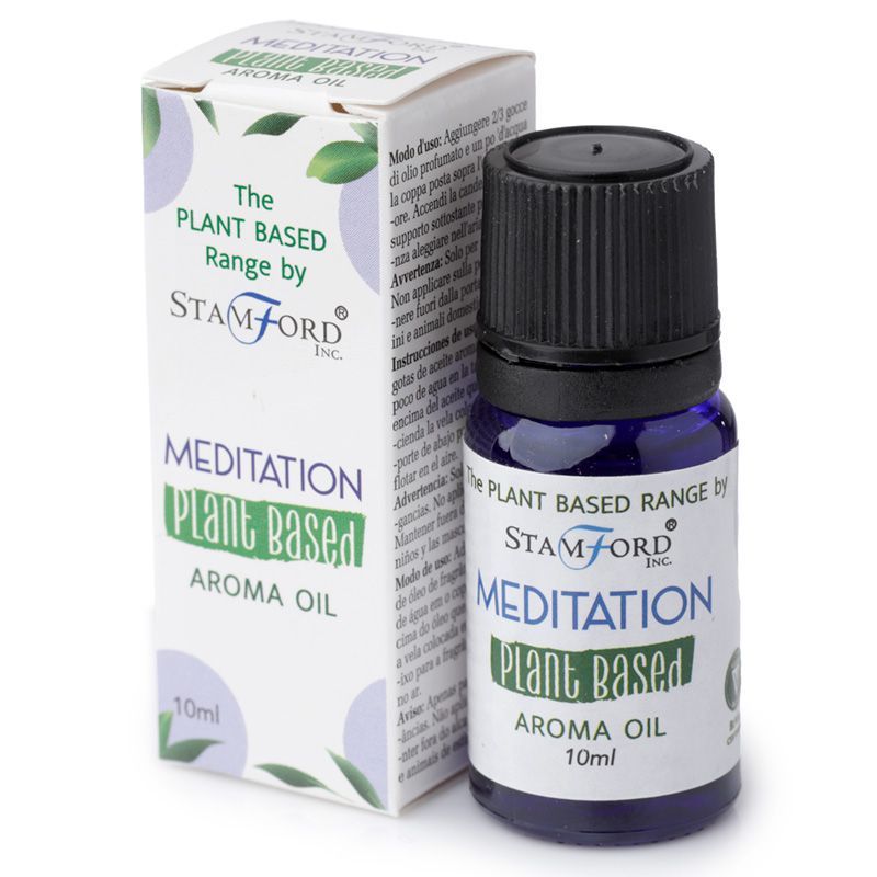 A small amber glass bottle of plant-based meditation aroma oil with a minimalist label.