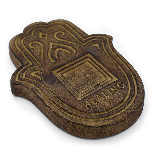 Round incense plate with a weathered antique stone finish and a central hole for incense sticks.
