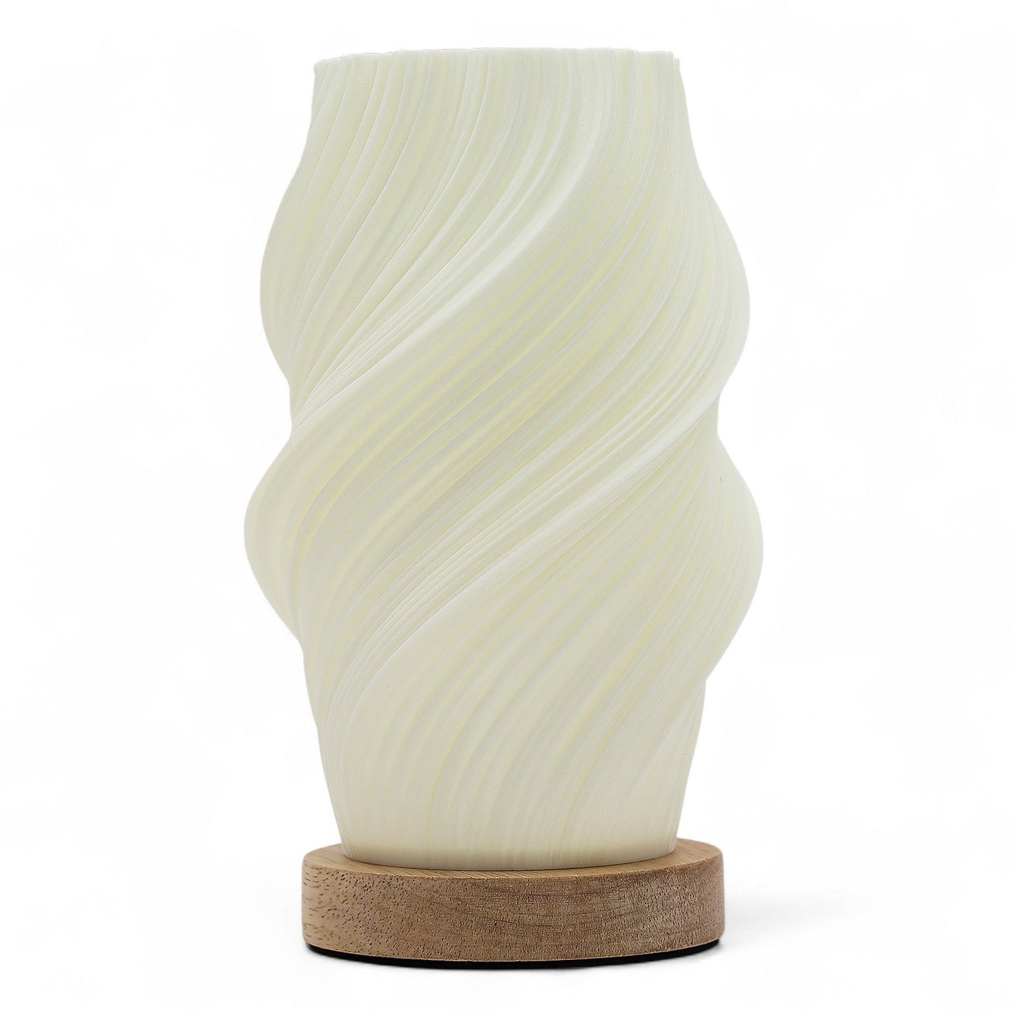 Sleek modern lamp with a fluid white spiral design resembling a twisted cloud on a minimalist base.