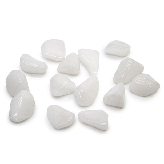 A smooth, opaque white tumbled Snow Quartz crystal stone with a polished finish.