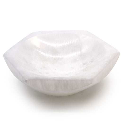 Hexagonal white selenite crystal bowl with a smooth translucent finish and natural mineral texture.