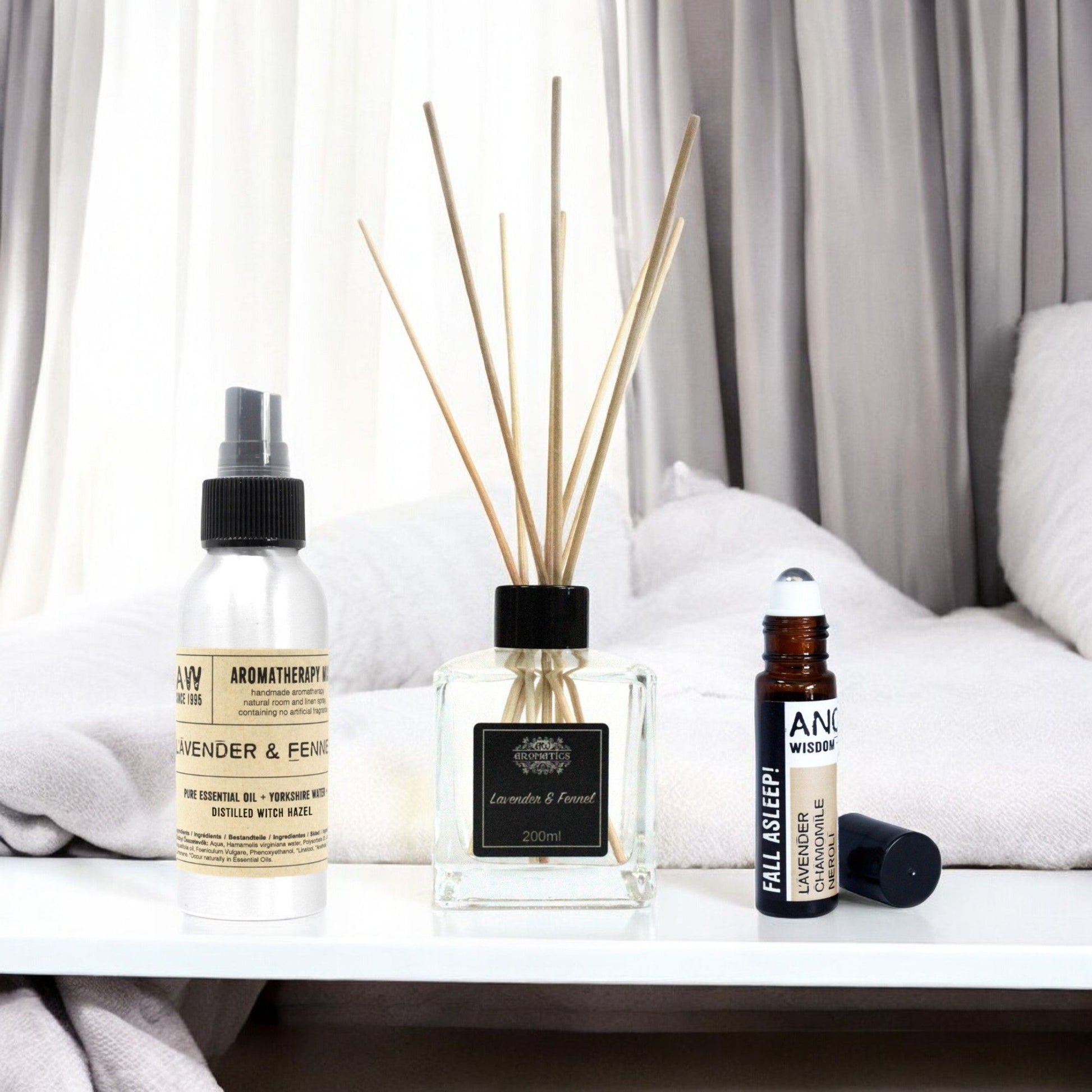 Aromatherapy sleep kit featuring a lavender and fennel essential oil mist bottle in a serene setting.