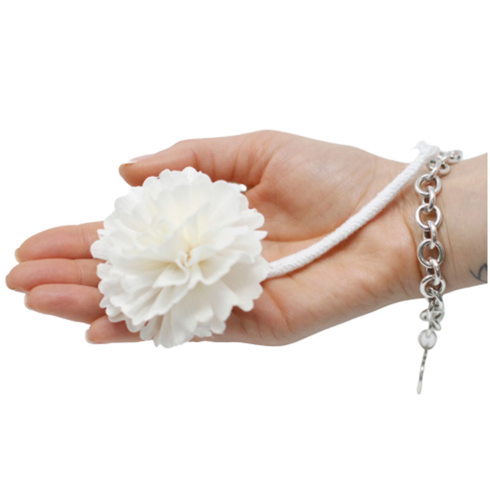 Handcrafted white carnation flower made from sola wood with a cotton string for fragrance diffusion.