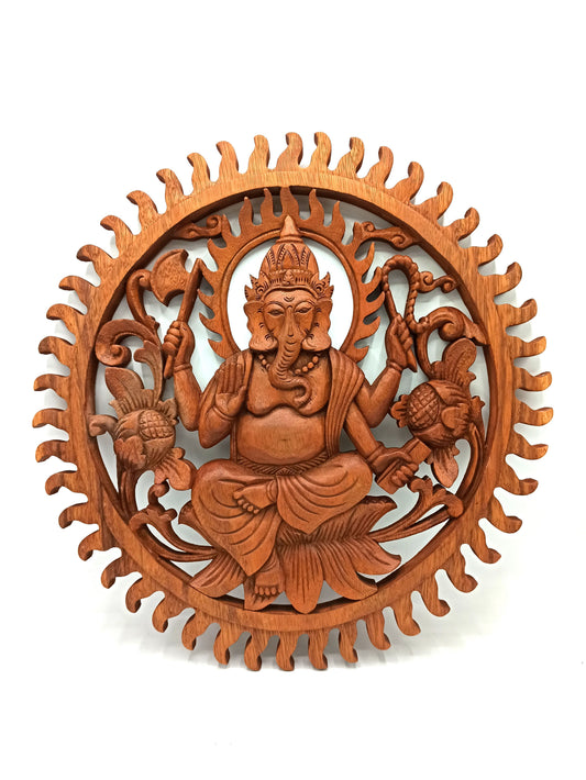 Intricately hand-carved circular wooden wall panel featuring the Hindu deity Lord Ganesha.