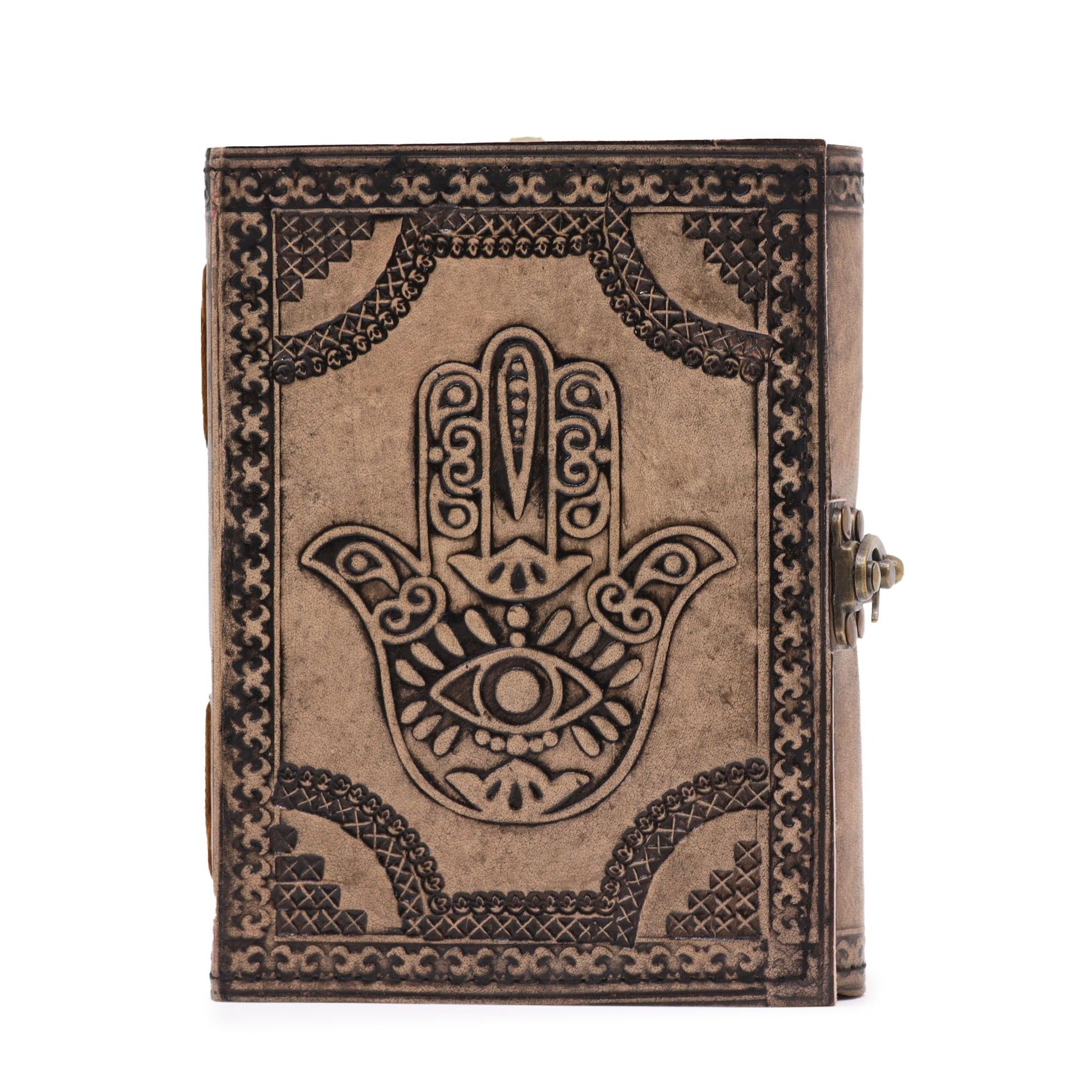 Antique grey leather notebook featuring an embossed Hamsa hand design with decorative stitched edges on a dark surface.