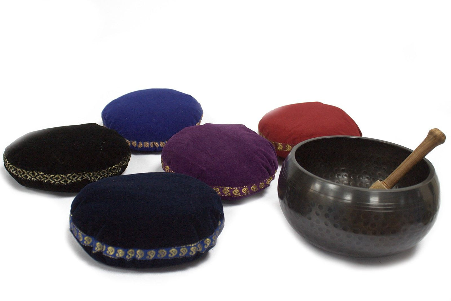 Round plush velvet cushion for a Tibetan singing bowl in an assorted vibrant colour with decorative piping.