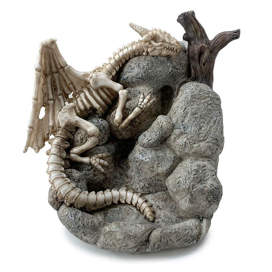 Detailed grey dragon skull incense burner with smoke cascading from its mouth into a pool of bones.