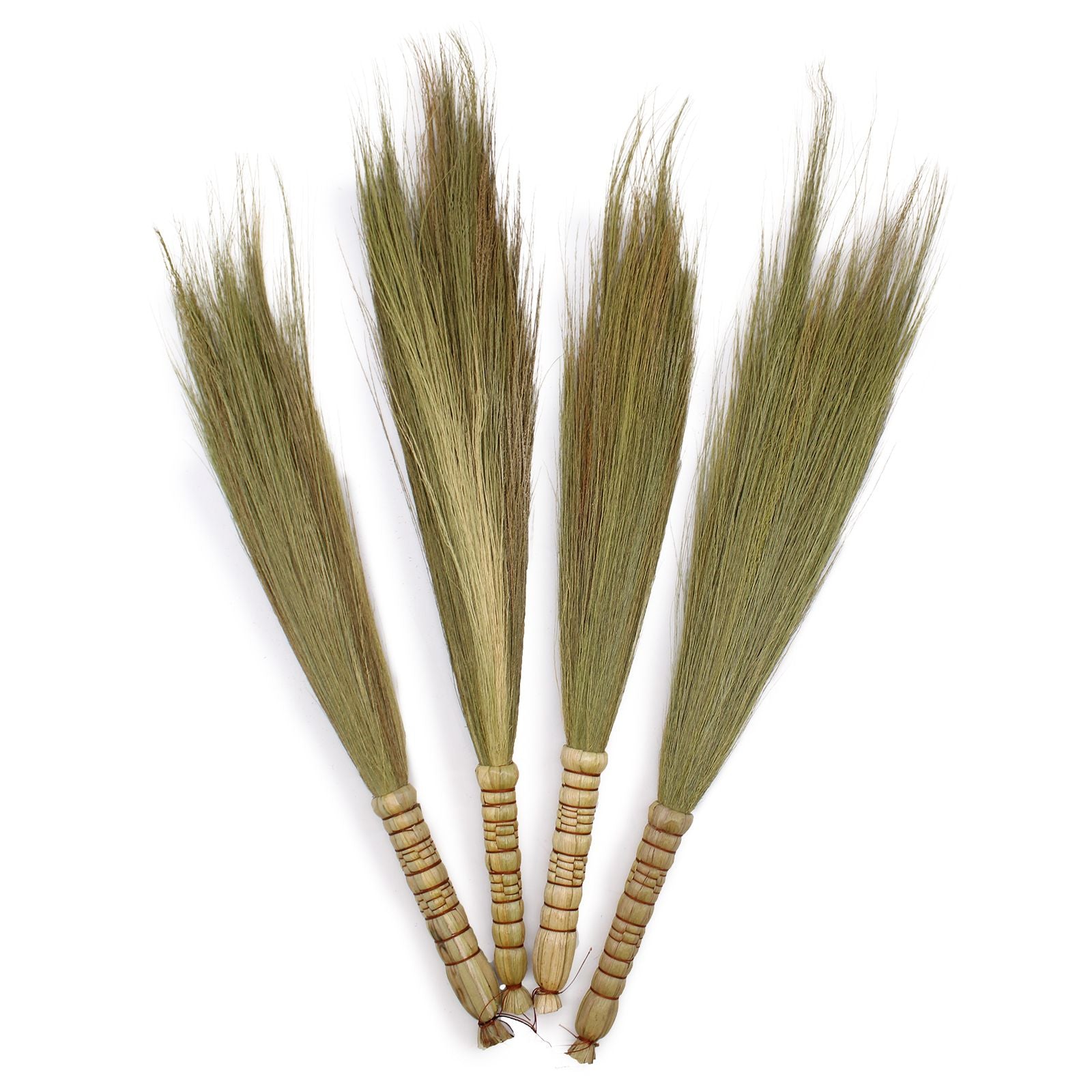 Four natural decorative pampas grass brooms with dried textured plumes and woven handles against a neutral background.