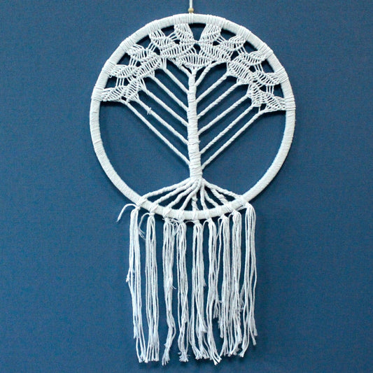 Large intricate macrame dreamcatcher featuring a woven Tree of Life design in a bohemian style with long hanging tassels.