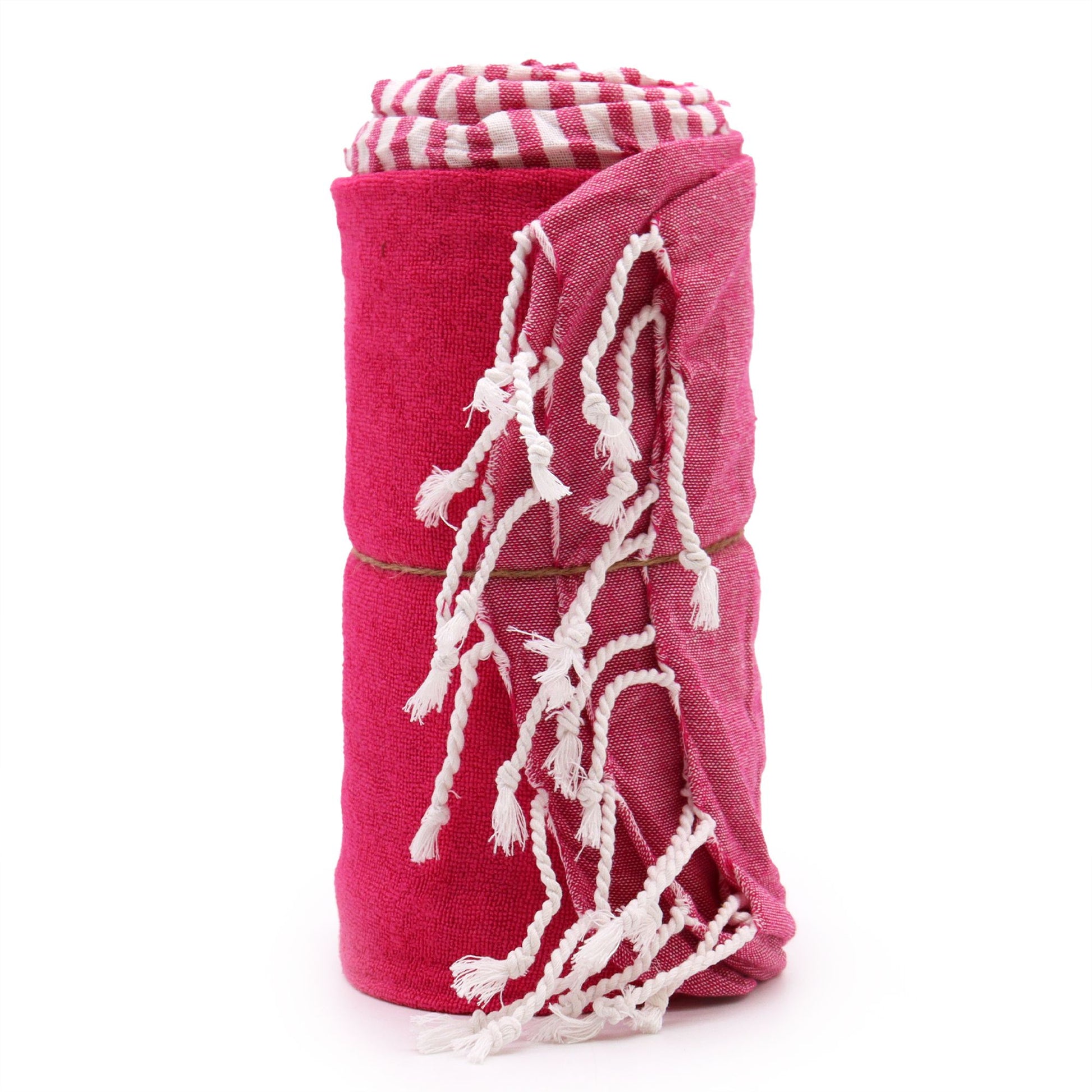 Handcrafted hot pink cotton pareo towel with a soft woven texture and a generous rectangular shape.