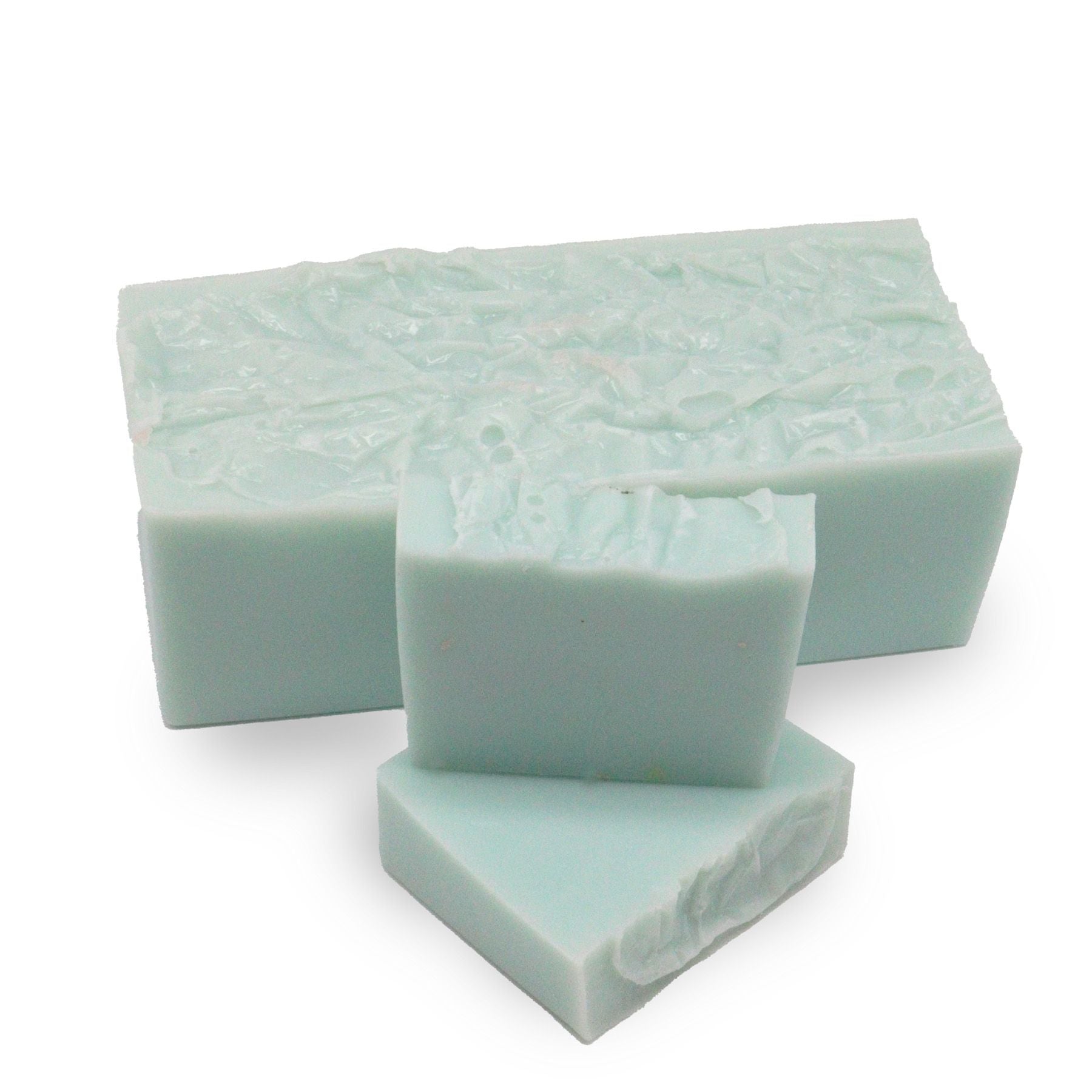 Handcrafted purple and blue marbled soap loaf with a textured top and natural dried botanical inclusions.
