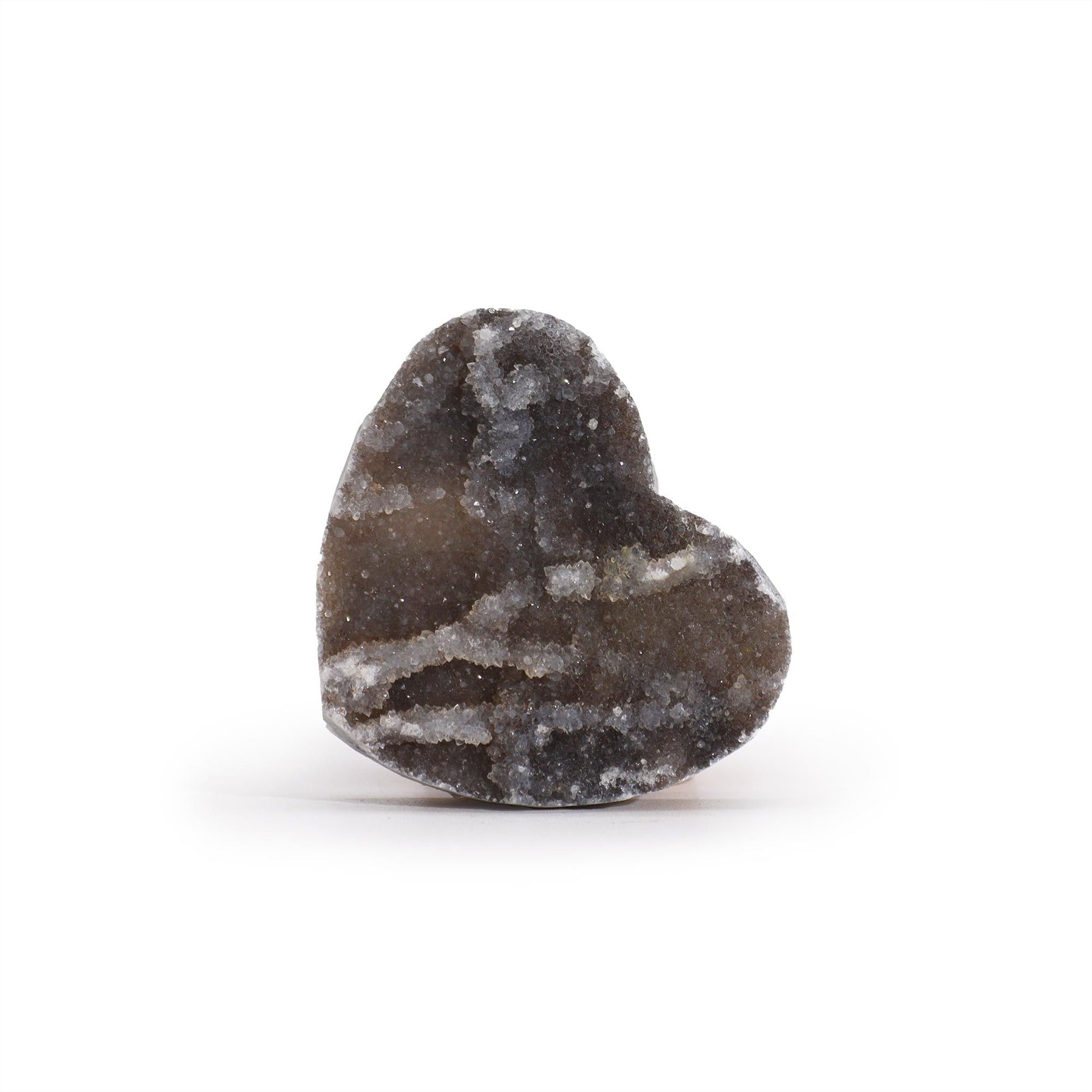 A small, polished heart-shaped calcite crystal showing natural banding and soft crystalline textures.