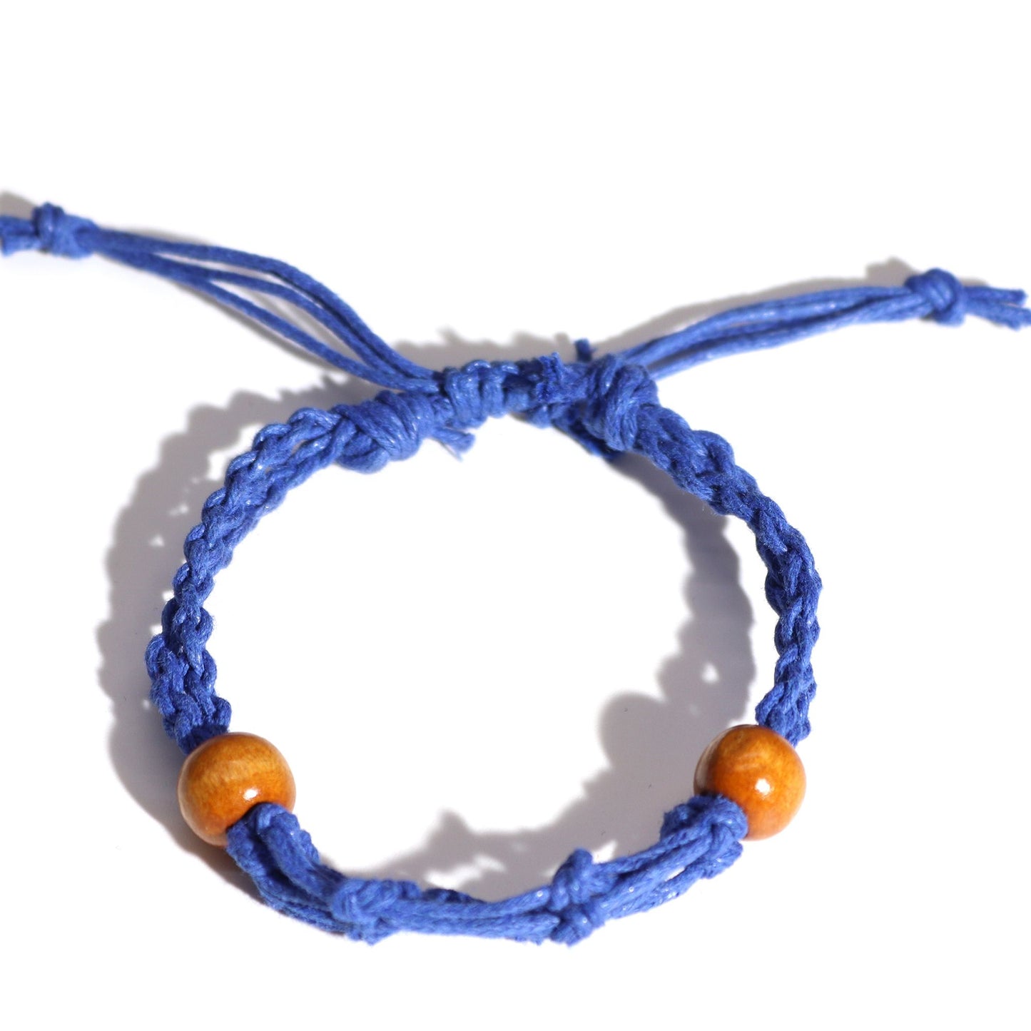 Adjustable navy blue cord for gemstone bracelets with sliding knot closure on a white background.