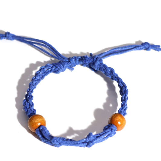 Adjustable navy blue cord for gemstone bracelets with sliding knot closure on a white background.