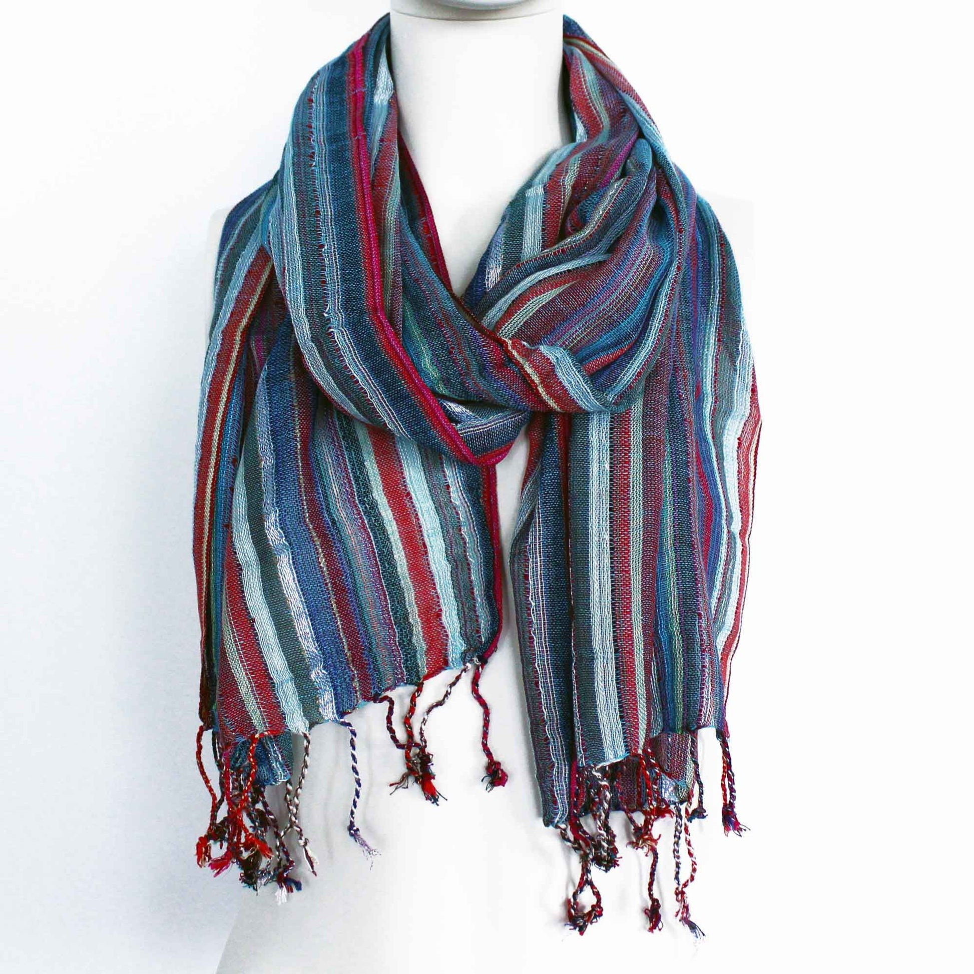 Beautifully patterned Indian boho scarf featuring a mix of vibrant blue shades and traditional designs.