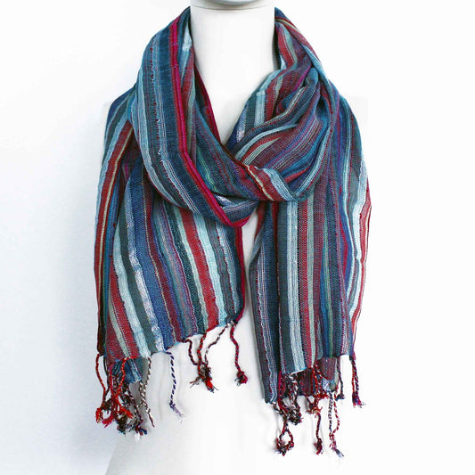 Beautifully patterned Indian boho scarf featuring a mix of vibrant blue shades and traditional designs.