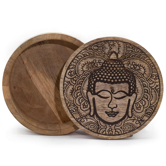 Large round black wooden box featuring an intricately engraved Buddha face on the lid.