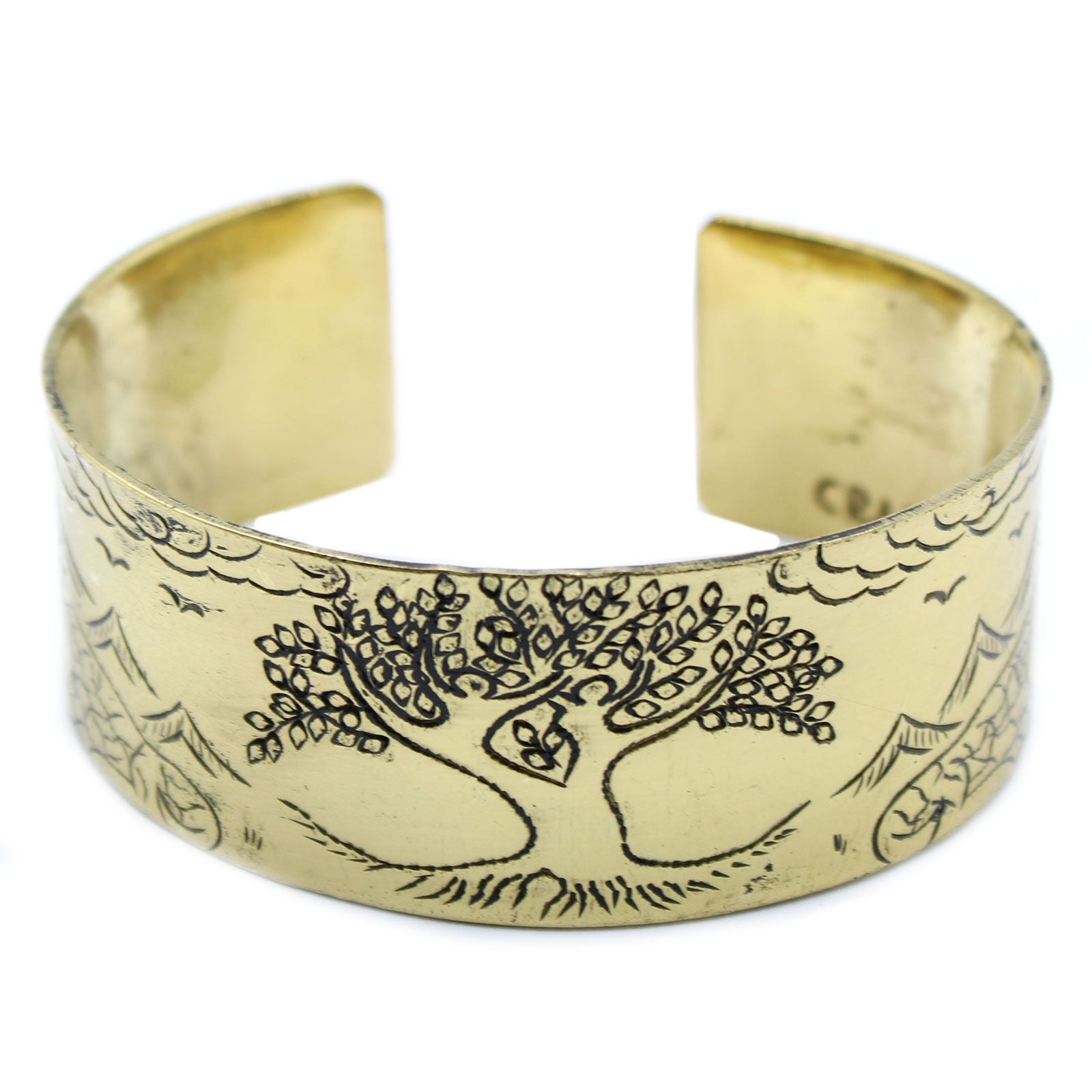 Adjustable brass cuff bracelet engraved with Tibetan mantras and a central Tree of Life symbol.
