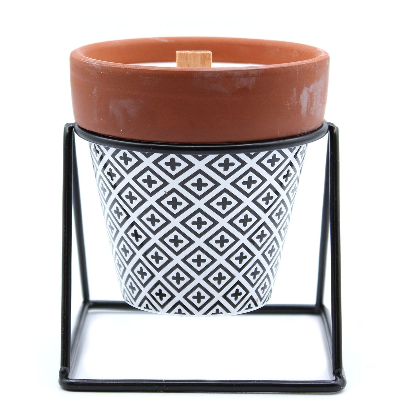 Lavender scented soy wax candle in a rustic terracotta style pot featuring a natural wooden wick.