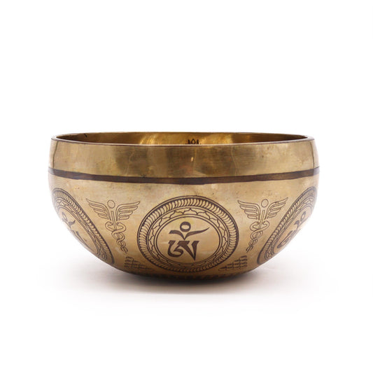 Handcrafted 16cm Tibetan healing bowl featuring an intricate engraving of a Bodhi tree and Buddha.