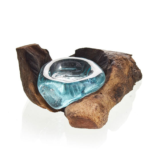 Unique handmade candle holder featuring clear molten glass slumped over a natural piece of reclaimed wood.