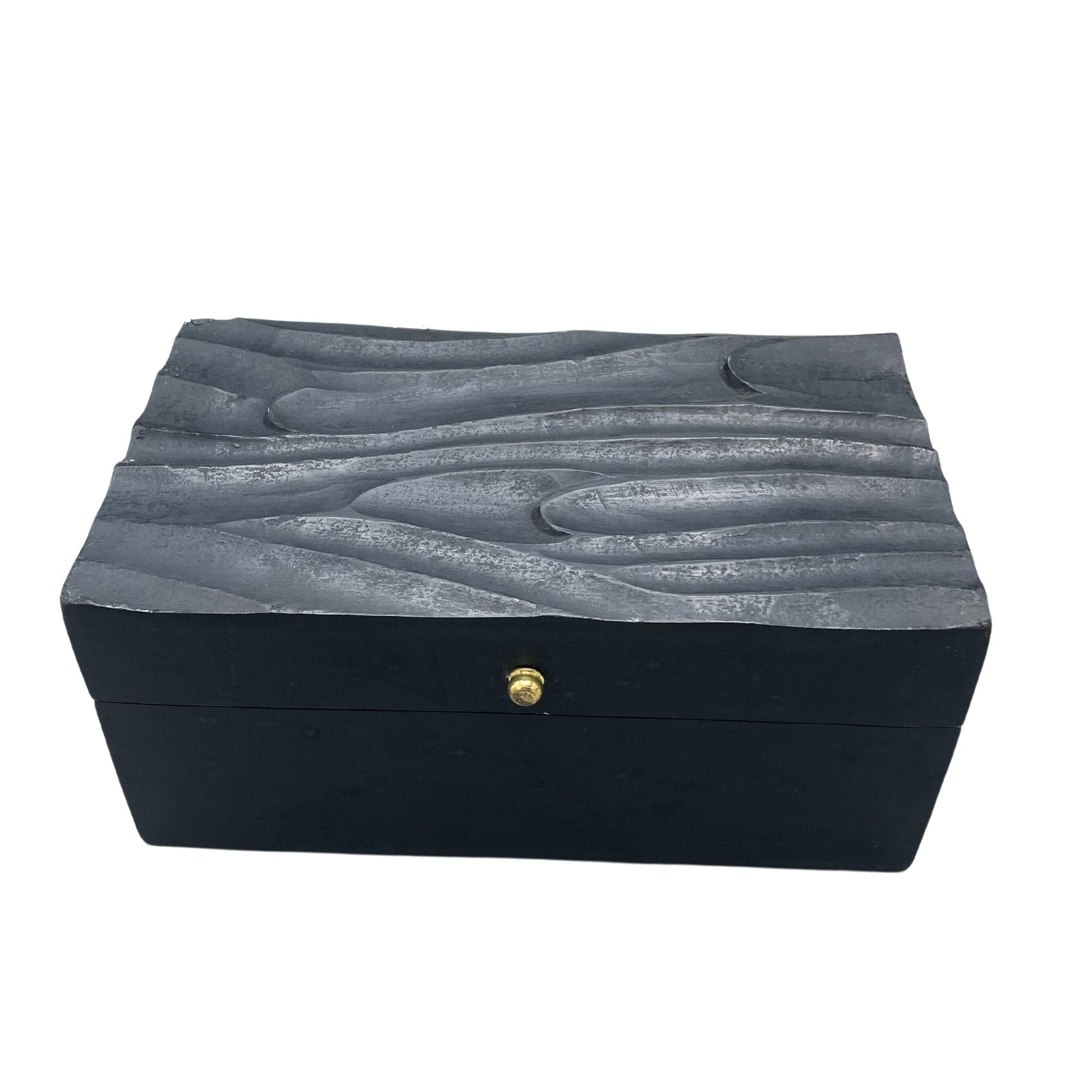 Rectangular decorative wooden storage box featuring an intricate black swirl pattern on the lid.