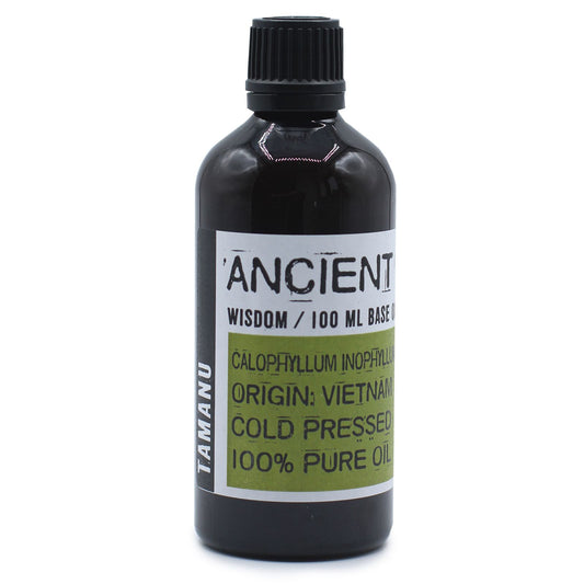 50ml amber glass bottle of pure Tamanu base oil for skincare and aromatherapy.
