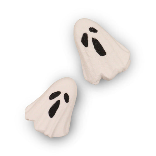 Small white ghost-shaped bath bomb with a cute spooky design for Halloween bathing.