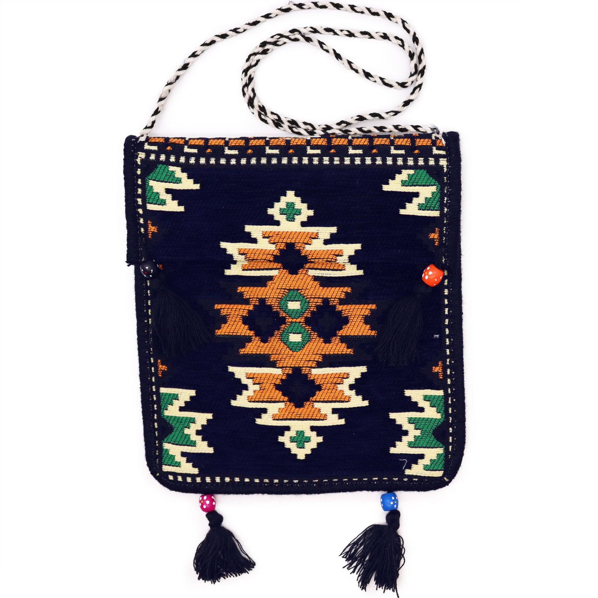 Dark navy kilim messenger bag with traditional Turkish handwoven patterns and rich, vibrant colours.