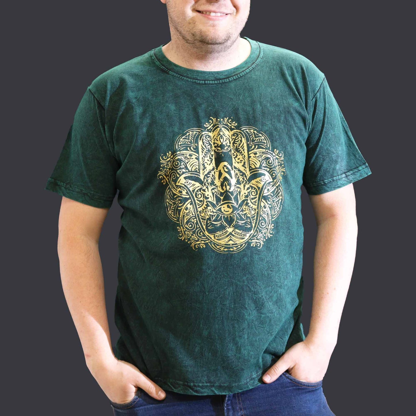 Extra large green stonewashed cotton t-shirt featuring a central Hamsa hand symbol in a bohemian style.