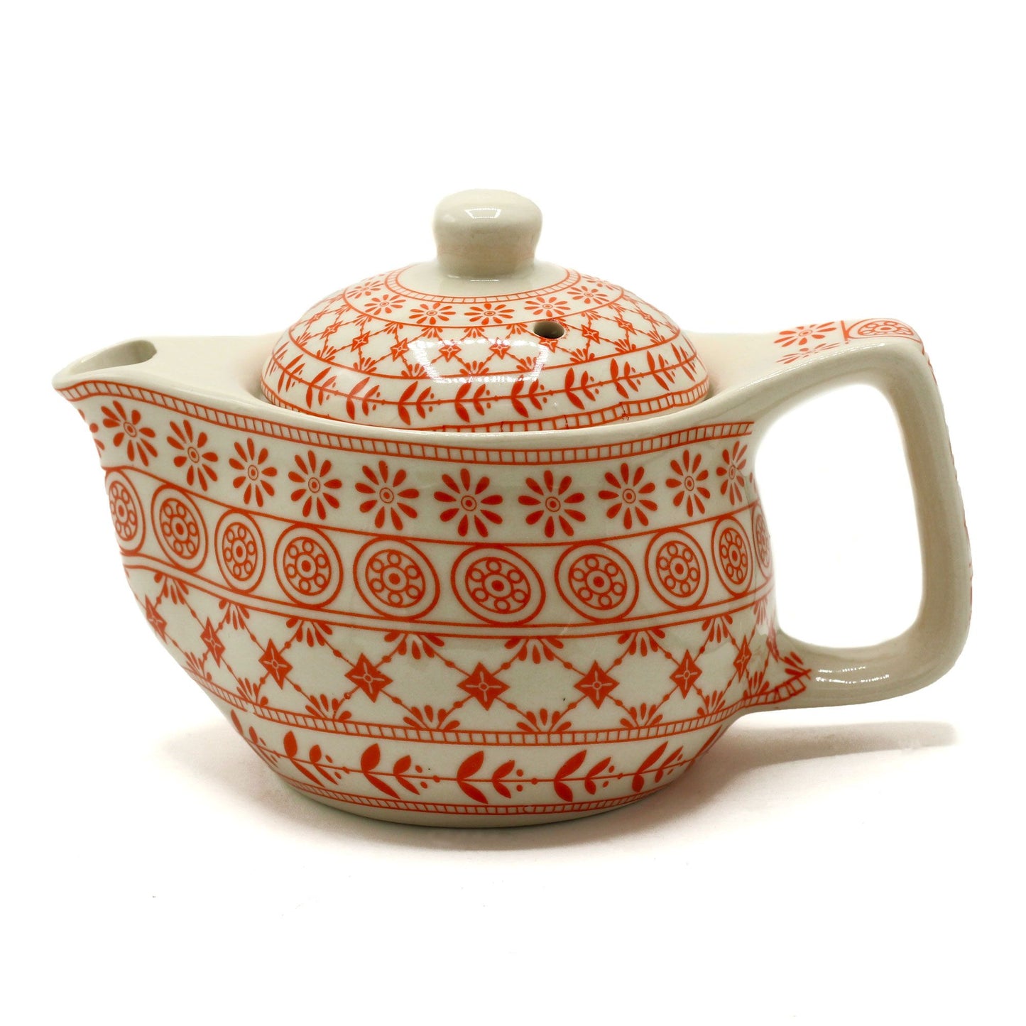 Elegant small amber-coloured glass teapot with a minimalist design and ergonomic handle for individual tea service.