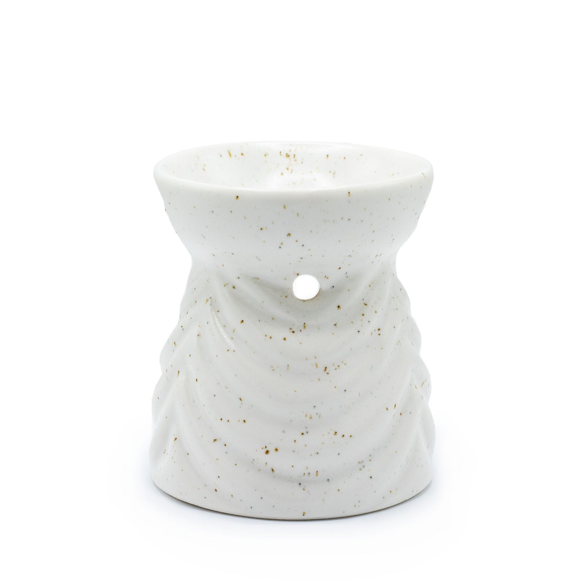Elegant ivory ceramic oil burner with a modern geometric cut-out design and a smooth matte finish.